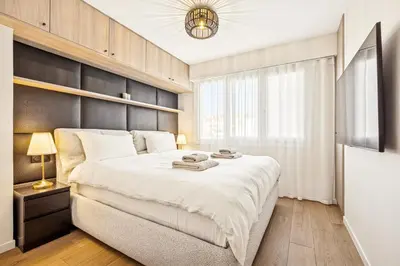 Un ou plusieurs lits dans un hébergement de l'établissement Magnifique appartement à 50 mètres de la Croisette