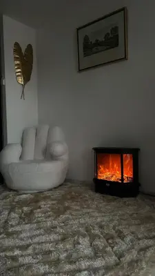 Coin salon dans l'établissement Appartement luxe Jaccuzi marbre et terrasse