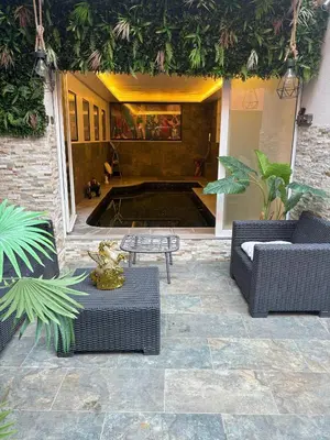 Coin salon dans l'établissement T4 Front de mer Piscine interieure privee Clim
