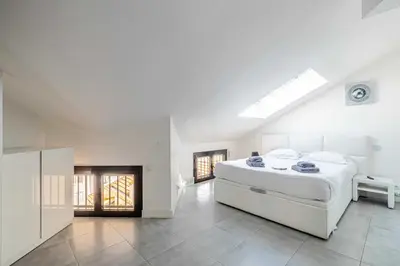 Un ou plusieurs lits dans un hébergement de l'établissement Luxury Penthouse 120mÂ² in the heart of Cannes