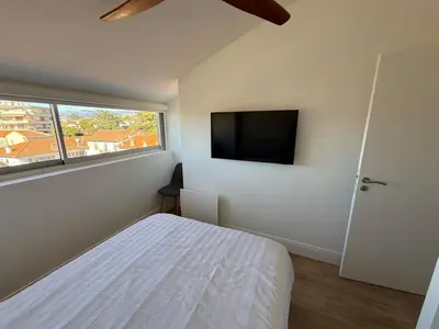 Télévision ou salle de divertissement dans l'établissement Roof top Luxe Cannes
