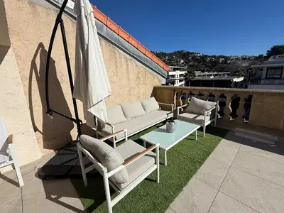 Coin salon dans l'établissement Roof top Luxe Cannes