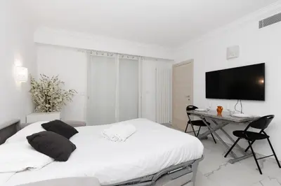 Un ou plusieurs lits dans un hébergement de l'établissement Immogroom - Studio - Sea View - AC