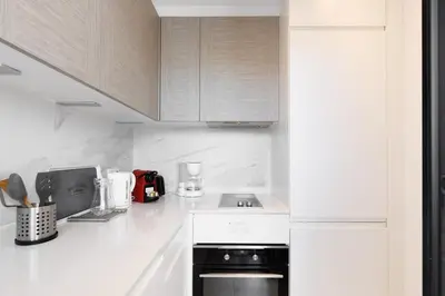 Cuisine ou kitchenette dans l'établissement Immogroom - Studio - Sea View - AC