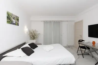 Un ou plusieurs lits dans un hébergement de l'établissement Immogroom - Studio - Sea View - AC