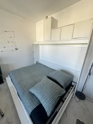 Un ou plusieurs lits dans un hébergement de l'établissement Studio near Hippodrome & Seaside