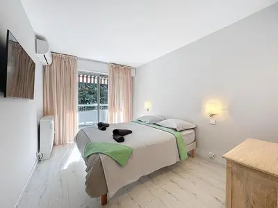 Un ou plusieurs lits dans un hébergement de l'établissement Rue d'Antibes Victoria 2 rooms terrace - 2ES