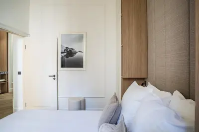 Un ou plusieurs lits dans un hébergement de l'établissement 106 ANTIBES - Luxurious 4-bedroom apartment Rue d'Antibes