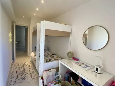 Un ou plusieurs lits dans un hébergement de l'établissement Cannes - Magnifique 4 pièces terrasse au calme à deux pas de la rue d'Antibes