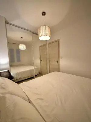 Un ou plusieurs lits dans un hébergement de l'établissement Luxury Cannes Suite Terrace Walk to Palais