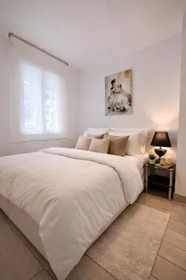 Un ou plusieurs lits dans un hébergement de l'établissement Luxury Cannes Suite Terrace Walk to Palais