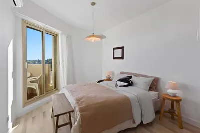 Un ou plusieurs lits dans un hébergement de l'établissement Le Rooftop - Jacuzzi - Mer - Terrasse 180 - Parking
