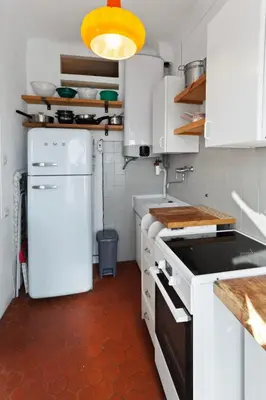 Cuisine ou kitchenette dans l'établissement Le Picasso - Hypercentre - Duplex - Rooftop - Clim - Escaliers
