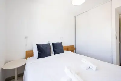 Un ou plusieurs lits dans un hébergement de l'établissement La Belle Antibes - Two bedroom