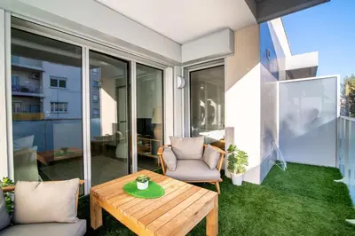 Coin salon dans l'établissement 66 Poincaré - Luxury apartment for 2 people - air conditioning, - parking