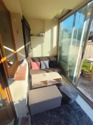 Coin salon dans l'établissement Appartement avec piscine à Villeneuve-Loubet, 27 m²