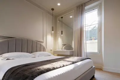 Un ou plusieurs lits dans un hébergement de l'établissement Modern AC apartment - 2BDR 4P - Cannes Beach