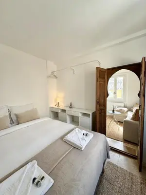 Un ou plusieurs lits dans un hébergement de l'établissement Le Cosy Revely, 2 pièces sur les remparts , climatisé