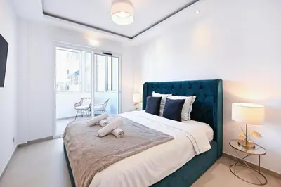 Un ou plusieurs lits dans un hébergement de l'établissement Two bedrooms with view over the sea