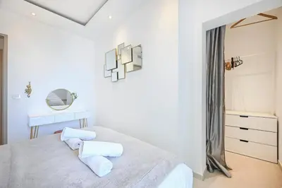 Un ou plusieurs lits dans un hébergement de l'établissement Two bedrooms with view over the sea