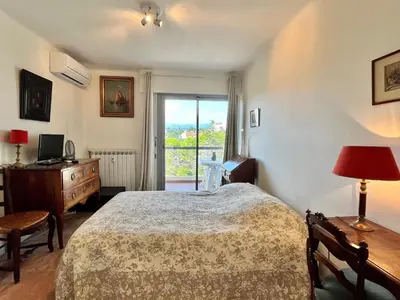 Un ou plusieurs lits dans un hébergement de l'établissement Méditerranée by Welcome to Cannes