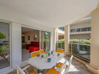 Coin salon dans l'établissement Apartment Eden Cap by Interhome
