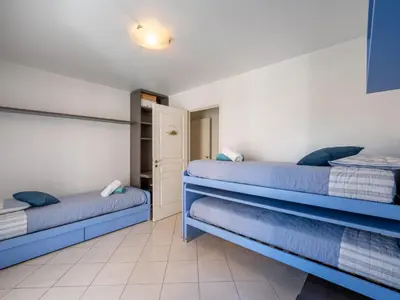 Un ou plusieurs lits dans un hébergement de l'établissement Apartment Les allées du Cap-2 by Interhome