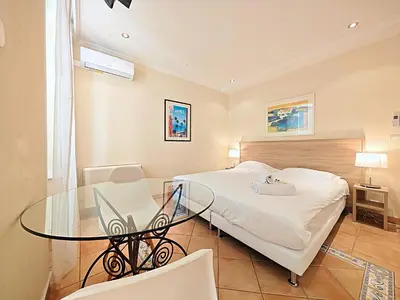 Un ou plusieurs lits dans un hébergement de l'établissement Viva Riviera Residence Commandant André
