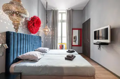 Un ou plusieurs lits dans un hébergement de l'établissement The Cosmopolitan Lodge
