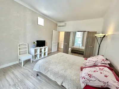 Un ou plusieurs lits dans un hébergement de l'établissement Amiral Courbet Apartment
