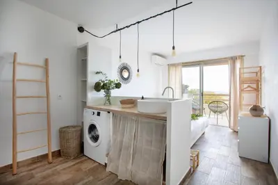 Cuisine ou kitchenette dans l'établissement Vue mer, terrasse et parking privé