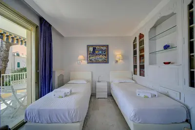 Un ou plusieurs lits dans un hébergement de l'établissement IMMOGROOM- Huge Terrace - Panoramic Sea View - 1min from Beach