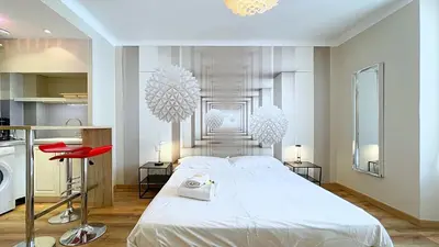 Un ou plusieurs lits dans un hébergement de l'établissement Hotel Le Florian