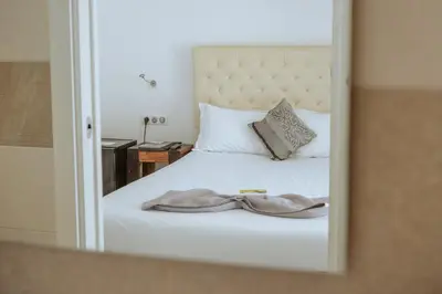 Un ou plusieurs lits dans un hébergement de l'établissement Hôtel du Bord de Mer 