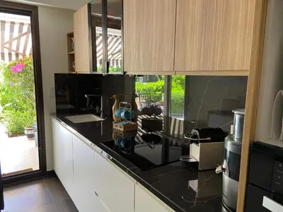 Cuisine ou kitchenette dans l'établissement Un Coin de Paradis