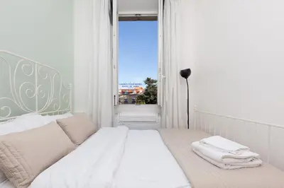 Un ou plusieurs lits dans un hébergement de l'établissement Apartment29