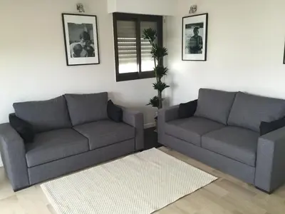 Coin salon dans l'établissement Appartement Residence Athena
