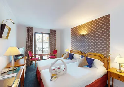 Un ou plusieurs lits dans un hébergement de l'établissement Sun Riviera Hotel