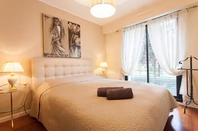 Un ou plusieurs lits dans un hébergement de l'établissement Carlton Riviera Apartment