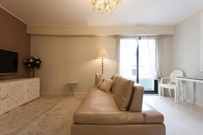Coin salon dans l'établissement Carlton Riviera Apartment