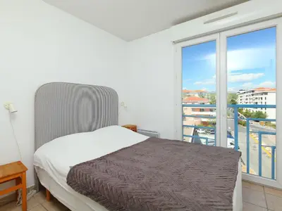Un ou plusieurs lits dans un hébergement de l'établissement Apartment Le Grand Large by Interhome