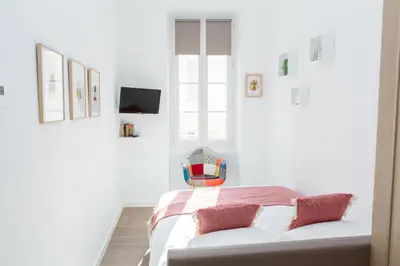 Un ou plusieurs lits dans un hébergement de l'établissement Cannes Le Chabaud