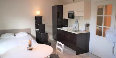 Un ou plusieurs lits dans un hébergement de l'établissement Domaine Juan Flore Studio Dauphin