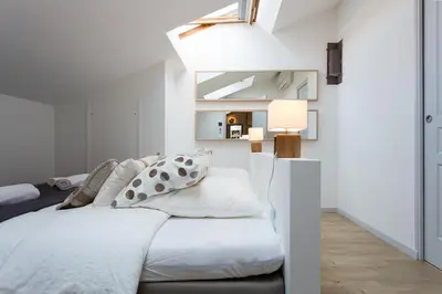 Un ou plusieurs lits dans un hébergement de l'établissement Teisseire Accomodations