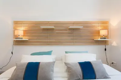 Un ou plusieurs lits dans un hébergement de l'établissement Teisseire Accomodations