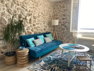 Coin salon dans l'établissement Appartement La Tourraque côté mer