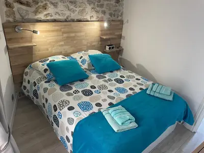 Un ou plusieurs lits dans un hébergement de l'établissement Appartement La Tourraque côté mer
