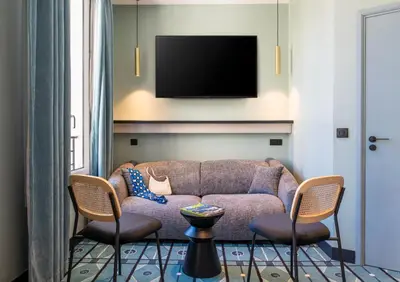 Télévision ou salle de divertissement dans l'établissement Hôtel CASA MOHO - Juan-Les-Pins