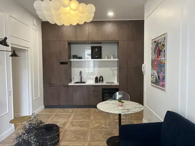 Cuisine ou kitchenette dans l'établissement Touchlux apartments