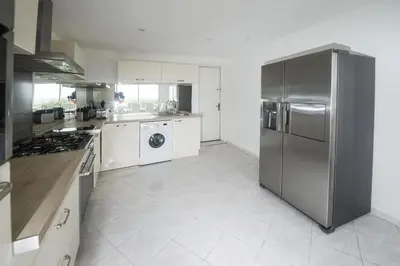 Cuisine ou kitchenette dans l'établissement Holiday Home with beautiful Sea View